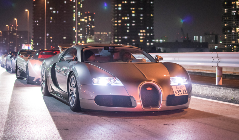 Illustration for article titled This Parking Lot In Tokyo Will Bring All Your Car Fantasies To Life